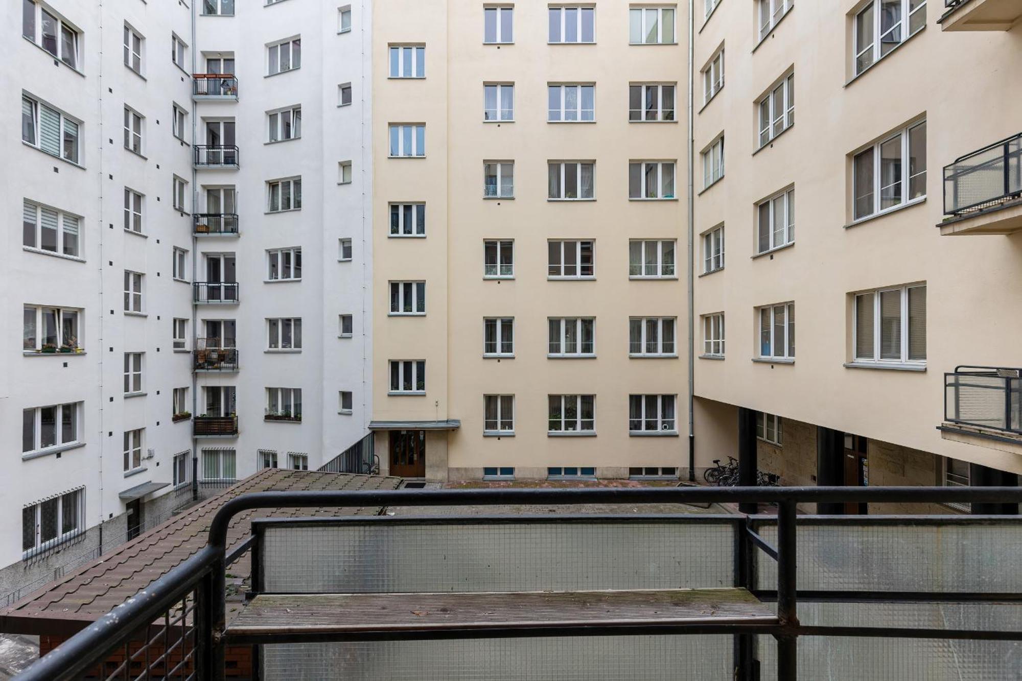 In The Center Of With Balcony And Separate Kitchen By Renters